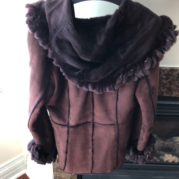 100% Lambs Shearling &rabbit fur trim, purchased @ Nordstrom.Very light but warm - Picture 4 of 13